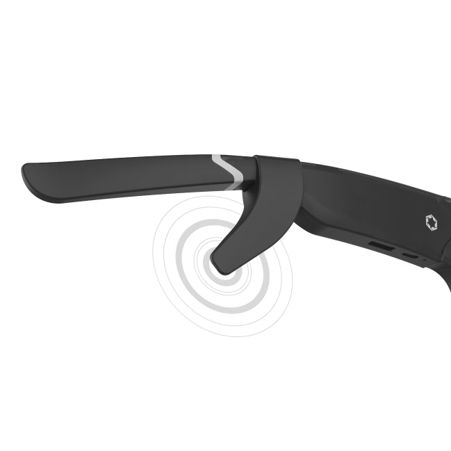 Close-up of the Lucyd Boosters arm for Lucyd Armor and Reebok smart glasses, showing a speaker icon with sound waves—highlighting built-in bone conduction audio. The sleek black design by Lucyd merges cutting-edge innovation with modern style.