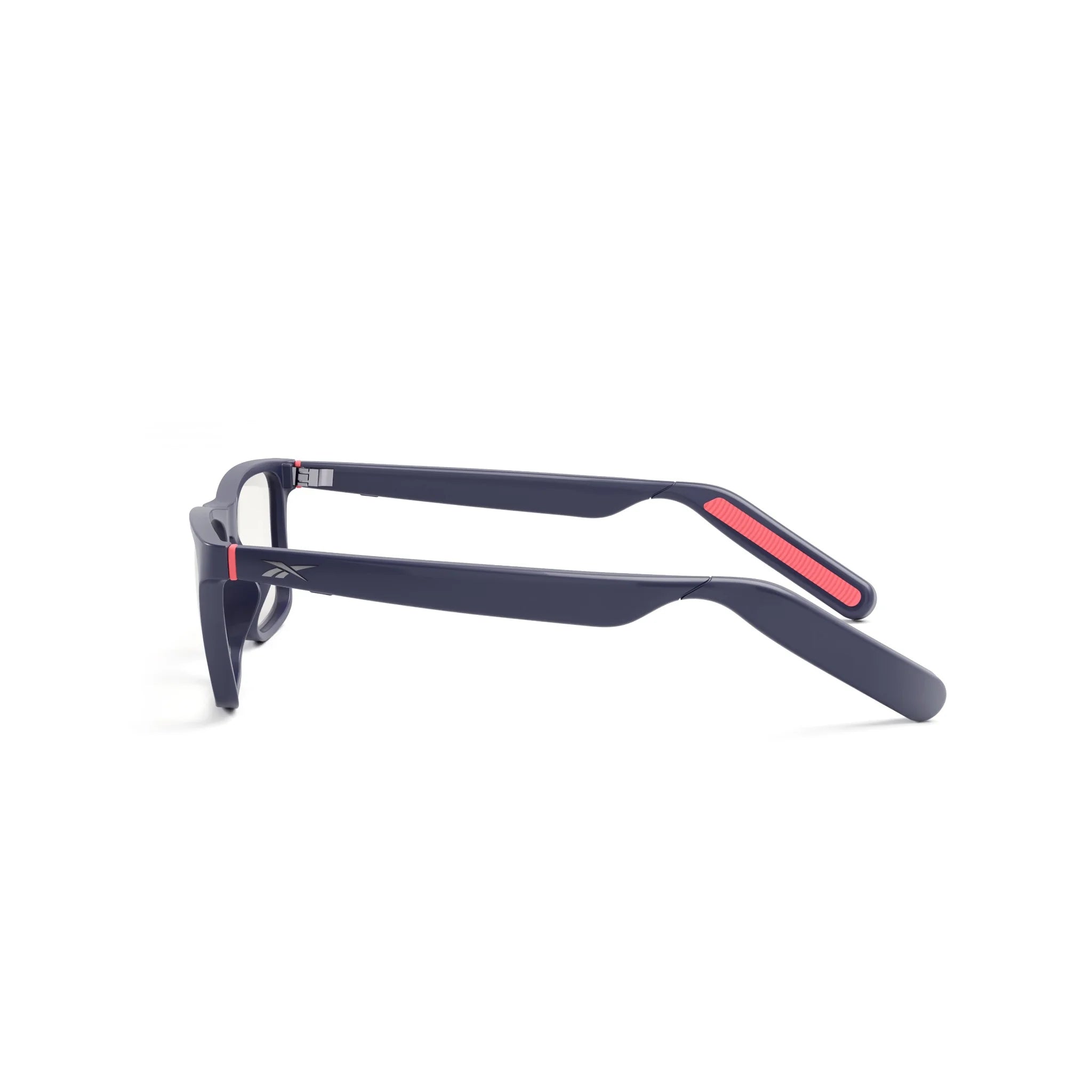 The Reebok Dash smart glasses feature thick dark frames and a sleek side view with a red accent stripe on the temples, seamlessly integrating open-ear audio. Shown against a plain white background.