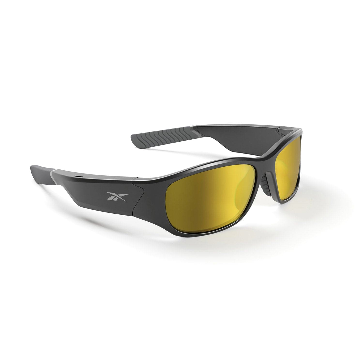The Reebok NITROUS are black wraparound Bluetooth sport glasses featuring yellow-tinted lenses and a textured, ridged inner arm design, shown against a white background.