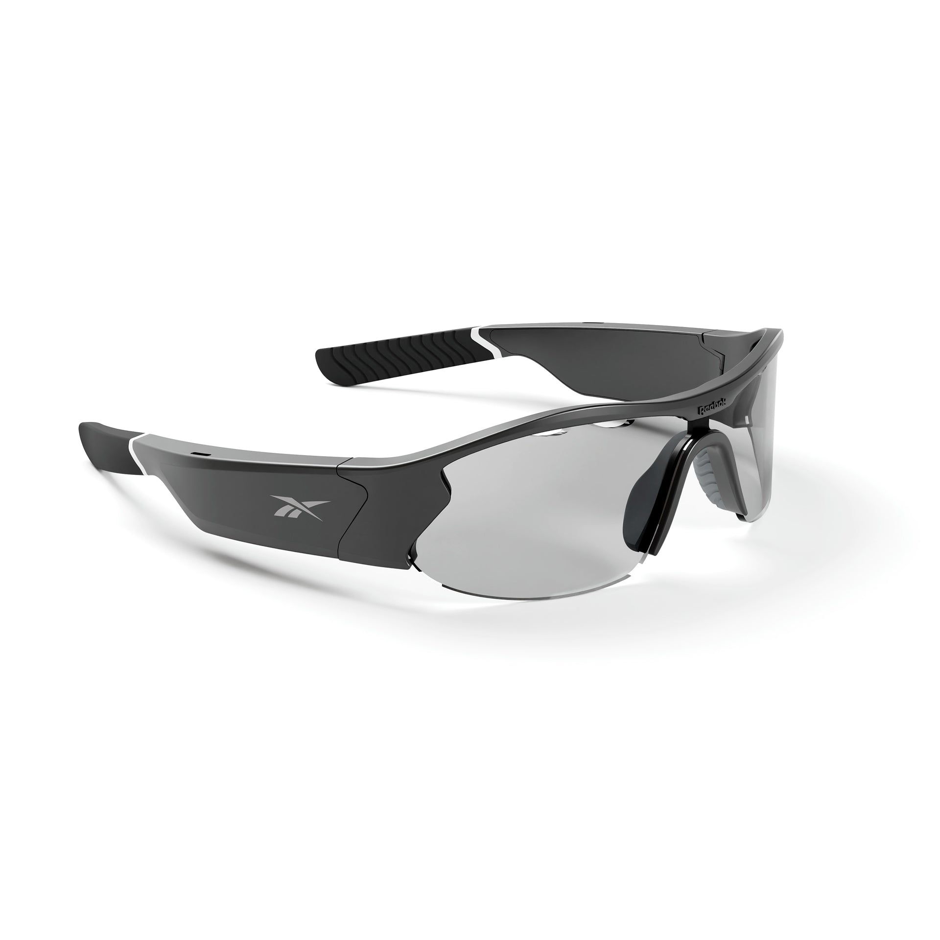 The Reebok Octane Shift is a sporty pair of black and gray wraparound smart eyewear with semi-rimless mirrored lenses and textured black arms, shown on a white background.